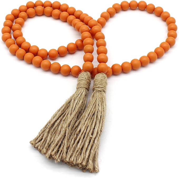 CVHOMEDECO. Wood Beads Garland with Tassels Farmhouse Rustic Wooden Prayer Bead String Wall Hanging Accent for Home Festival Decor. Orange