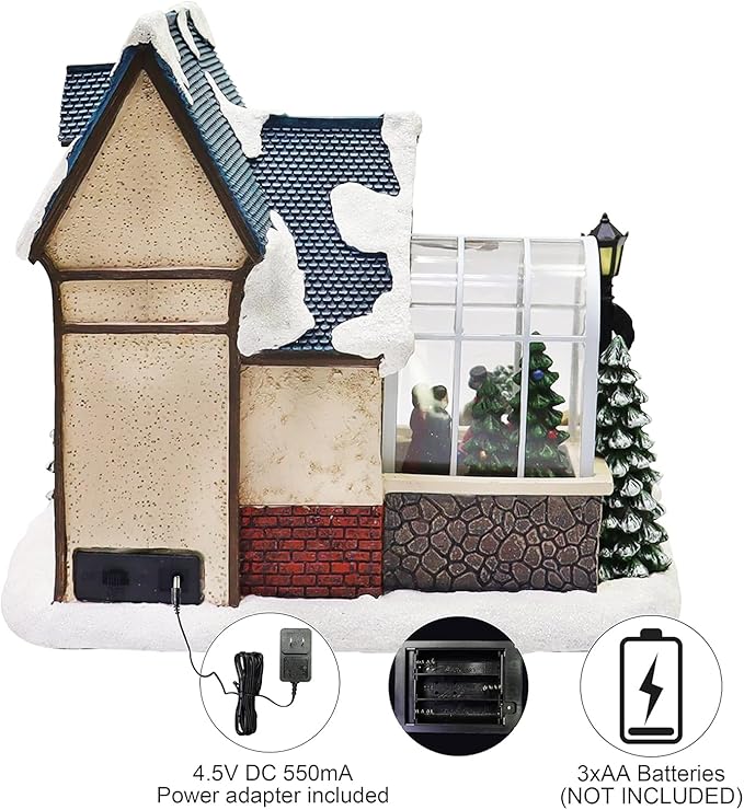 MOMENTS IN TIME Christmas Village Building Lighted Christmas Shop with LED Lights, Music & Snowman Battery Operated or Plug-in Vintage Holiday Village House Décor 8.5”H x 9.8”W x 6.9”D