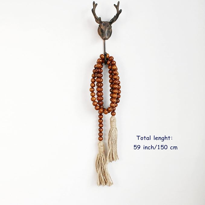 CVHOMEDECO. Wood Grain Beads Garland with Tassels Farmhouse Rustic Wooden Prayer Bead String Wall Hanging Accent for Home Festival Decor. Dark Tan