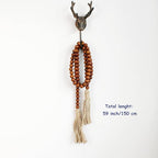 CVHOMEDECO. Wood Grain Beads Garland with Tassels Farmhouse Rustic Wooden Prayer Bead String Wall Hanging Accent for Home Festival Decor. Dark Tan