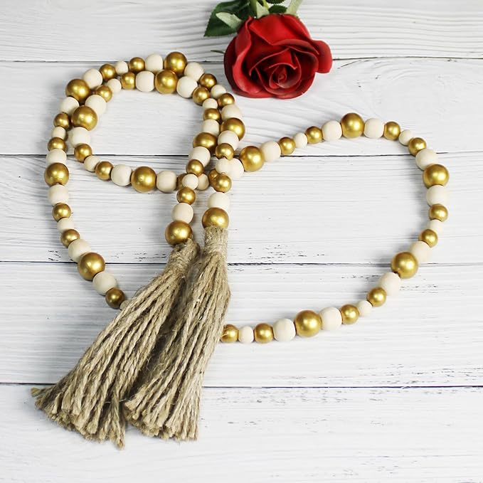 CVHOMEDECO. Wood Beads Garland with Tassels Farmhouse Rustic Wooden Prayer Bead String Wall Hanging Accent for Home Festival Decor. Gold Mix