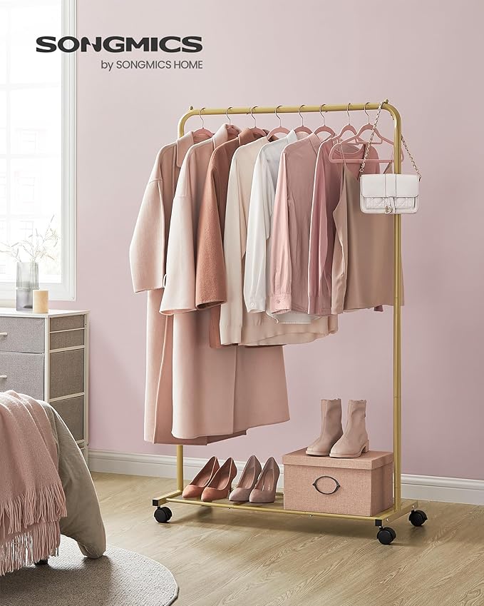SONGMICS Clothes Rack with Wheels, Clothing Rack for Hanging Clothes, 25.4 mm Metal Garment Rack with Dense Mesh Storage Shelf, 110 lb Load Capacity, 2 Brakes, Gold UHSR025A01