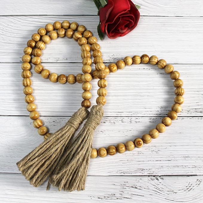 CVHOMEDECO. Wood Grain Beads Garland with Tassels Farmhouse Rustic Wooden Prayer Bead String Wall Hanging Accent for Home Festival Decor. Light Tan