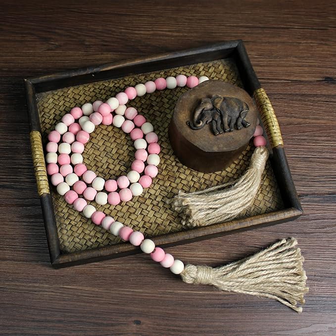 CVHOMEDECO. Wood Beads Garland with Tassels Farmhouse Rustic Wooden Prayer Bead String Wall Hanging Accent for Home Festival Decor. Pink Mix Distressed
